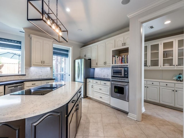 5909 Fossil Ridge Dr, Plano, TX 75093 - kitchen featuring appliances with stainless steel finishes, white cabinets, ornamental molding, tasteful backsplash, and recessed lighting