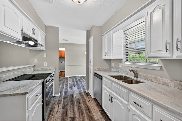 3214 N Marseille Ln, Sherman, TX 75090 - kitchen featuring stainless steel appliances, under cabinet range hood, white cabinets, dark wood finished floors, and a textured ceiling
