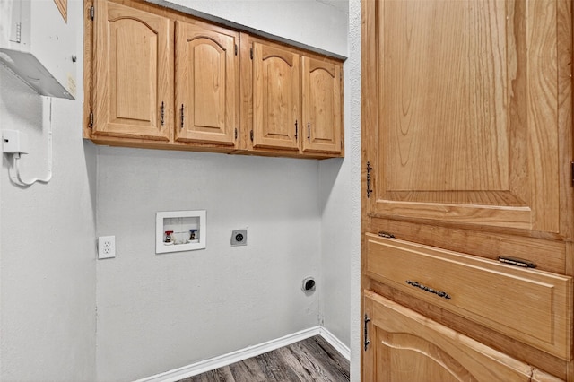 3214 N Marseille Ln, Sherman, TX 75090 - laundry room with electric dryer hookup, washer hookup, cabinet space, and dark wood-style floors