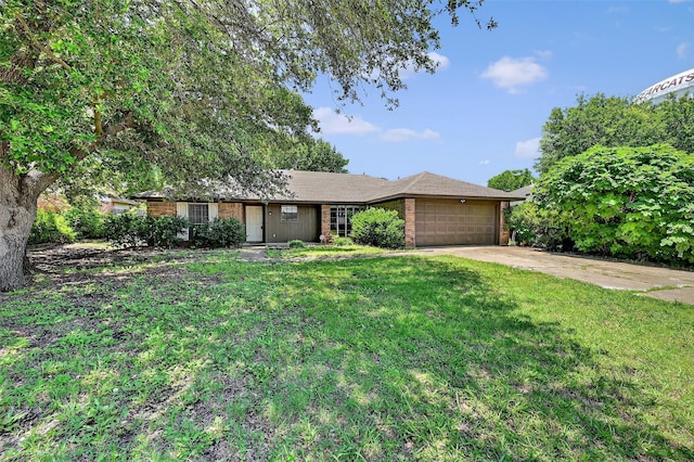 3214 N Marseille Ln, Sherman, TX 75090 - single story home with a garage, a front yard, driveway, and brick siding
