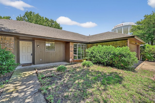 3214 N Marseille Ln, Sherman, TX 75090 - view of front facade with brick siding and a garage