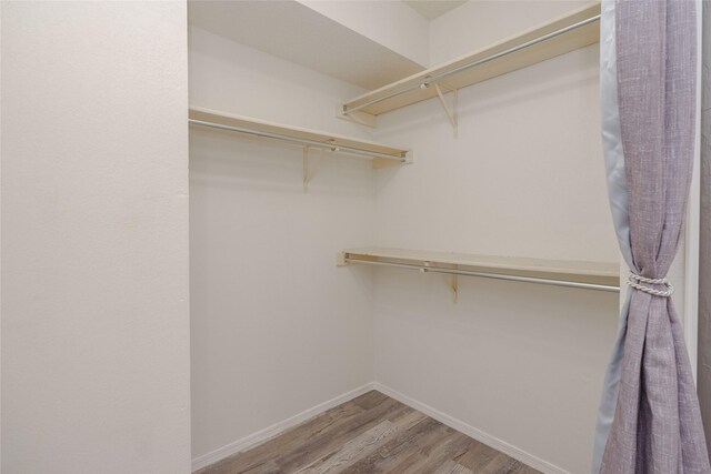 4324 Thames Ct, Flower Mound, TX 75028 - walk in closet with wood finished floors