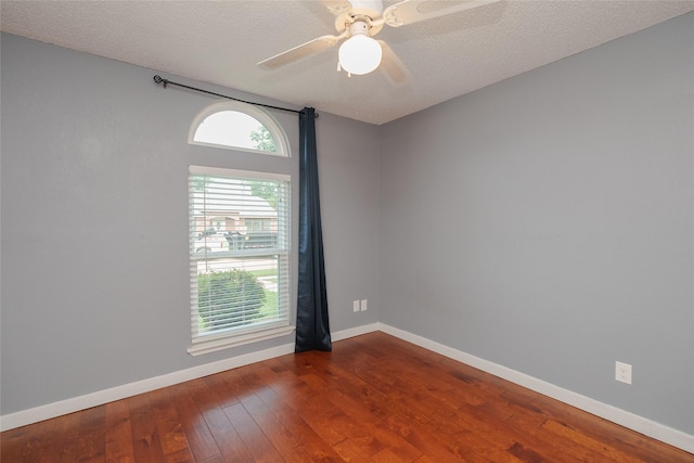 4324 Thames Ct, Flower Mound, TX 75028 - unfurnished room with dark wood finished floors, ceiling fan, and a textured ceiling