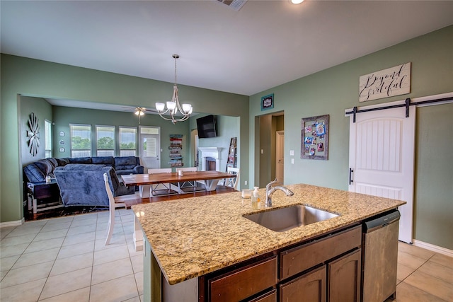 416 Mesa, Lone Oak, TX 75453 - kitchen with dishwasher, light tile patterned flooring, a chandelier, pendant lighting, and open floor plan