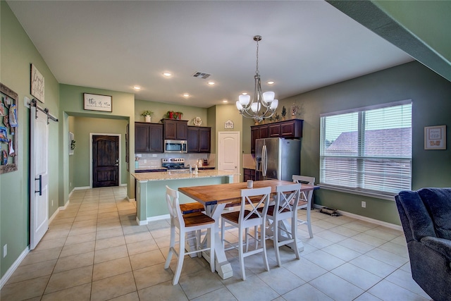 416 Mesa, Lone Oak, TX 75453 - dining room featuring a chandelier, light tile patterned flooring, recessed lighting, and a barn door
