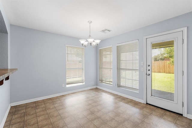 708 Sapphire Blvd, Hewitt, TX 76643 - unfurnished dining area with a chandelier and baseboards