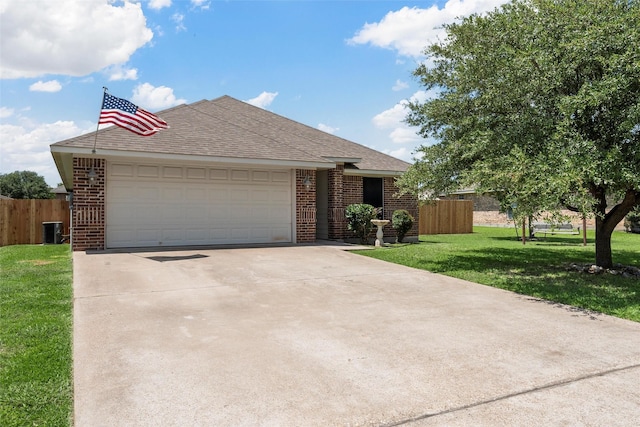 708 Sapphire Blvd, Hewitt, TX 76643 - view of front of property with brick siding, roof with shingles, a garage, and concrete driveway