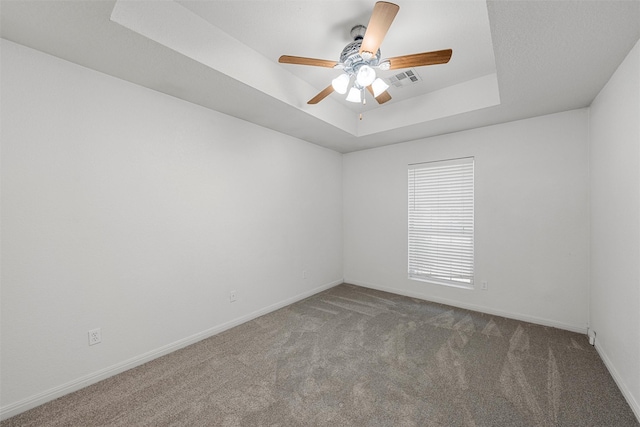 708 Sapphire Blvd, Hewitt, TX 76643 - carpeted empty room with a raised ceiling and ceiling fan