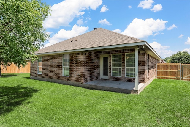 708 Sapphire Blvd, Hewitt, TX 76643 - rear view of house featuring brick siding, a fenced backyard, a patio area, and roof with shingles
