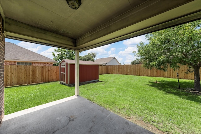 708 Sapphire Blvd, Hewitt, TX 76643 - fenced backyard featuring a patio area and a storage unit