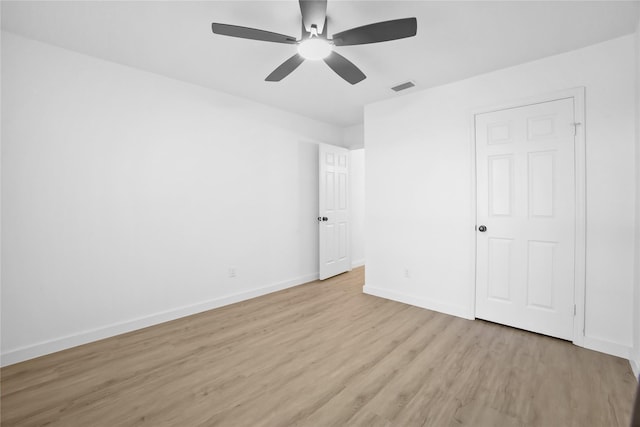 621 Drexel Dr, Grapevine, TX 76051 - unfurnished bedroom featuring light wood-type flooring and ceiling fan