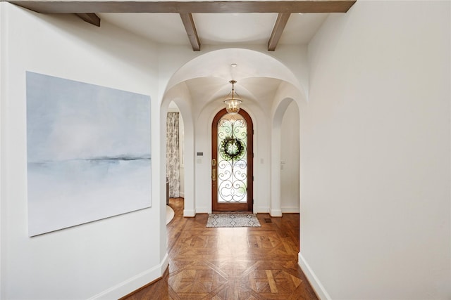 3404 Marquette St, University Park, TX 75225 - foyer featuring arched walkways and beamed ceiling