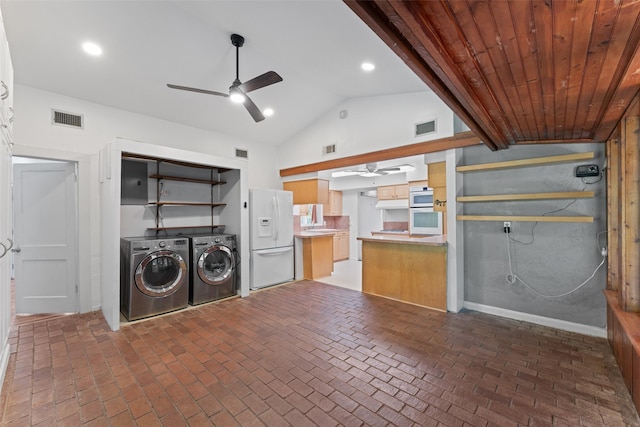 1227 N Irving Heights Dr, Irving, TX 75061 - laundry area with ceiling fan, brick flooring, washing machine and clothes dryer, and recessed lighting