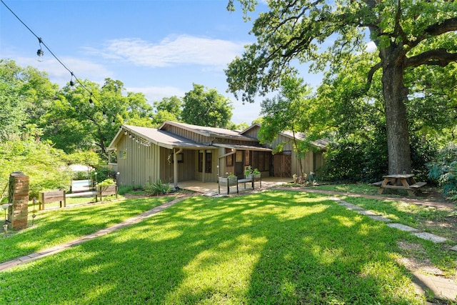 1227 N Irving Heights Dr, Irving, TX 75061 - view of grassy yard featuring a patio area