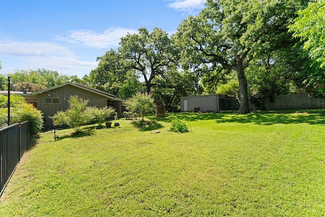 1227 N Irving Heights Dr, Irving, TX 75061 - fenced backyard with a storage unit