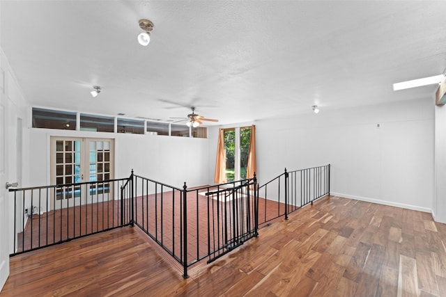 1227 N Irving Heights Dr, Irving, TX 75061 - hall with an upstairs landing, wood finished floors, and french doors