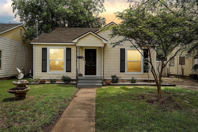 1205 Ashleman St, Bellmead, TX 76705 - view of front of property featuring a front yard and roof with shingles