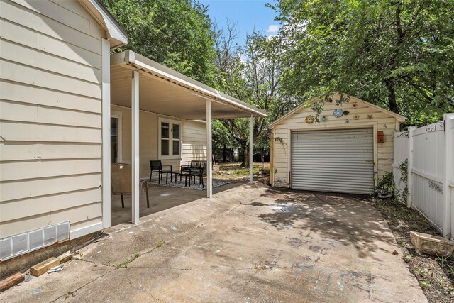 1205 Ashleman St, Bellmead, TX 76705 - detached garage with concrete driveway