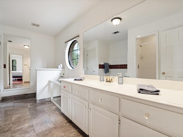 1210 Oak View Ct, Oak Point, TX 75068 - ensuite bathroom featuring vanity and a tile shower