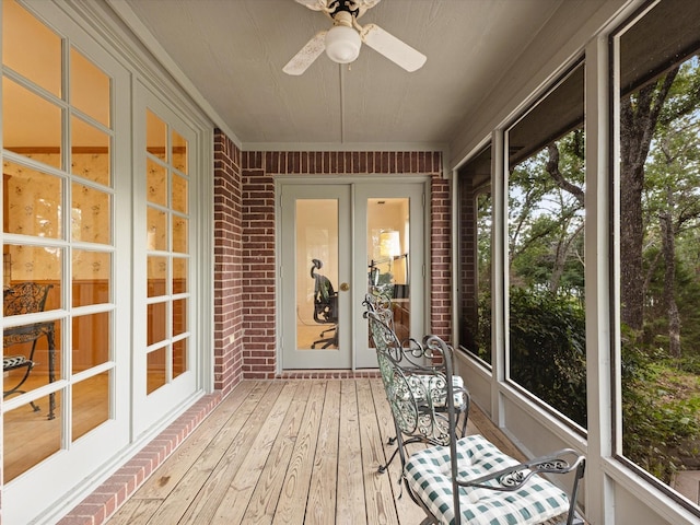 1210 Oak View Ct, Oak Point, TX 75068 - sunroom / solarium featuring french doors, brick wall, hardwood / wood-style flooring, a ceiling fan, and crown molding