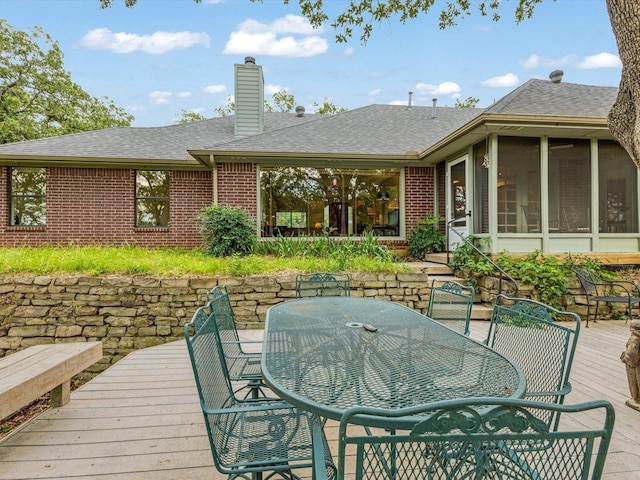 1210 Oak View Ct, Oak Point, TX 75068 - deck with outdoor dining space and a sunroom