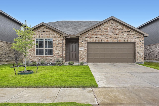 8009 Gangway Dr, Fort Worth, TX 76179 - view of front of home with a front lawn, a garage, driveway, brick siding, and a shingled roof