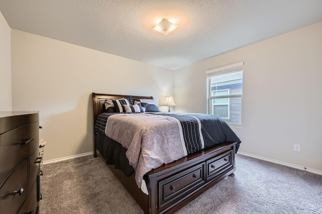 8009 Gangway Dr, Fort Worth, TX 76179 - bedroom with dark colored carpet and a textured ceiling