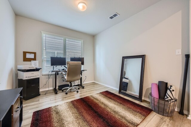 8009 Gangway Dr, Fort Worth, TX 76179 - home office featuring light wood-type flooring and baseboards