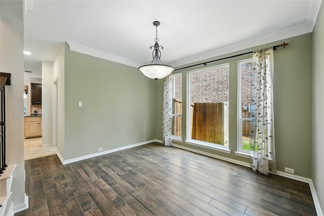 2908 Carterton Ct, Flower Mound, TX 75022 - unfurnished dining area with ornamental molding and dark wood finished floors
