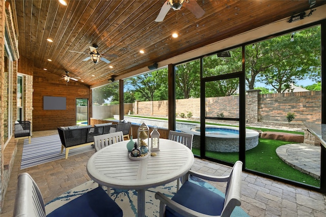 2908 Carterton Ct, Flower Mound, TX 75022 - sunroom featuring a ceiling fan, a jacuzzi, lofted ceiling, and an outdoor hangout area