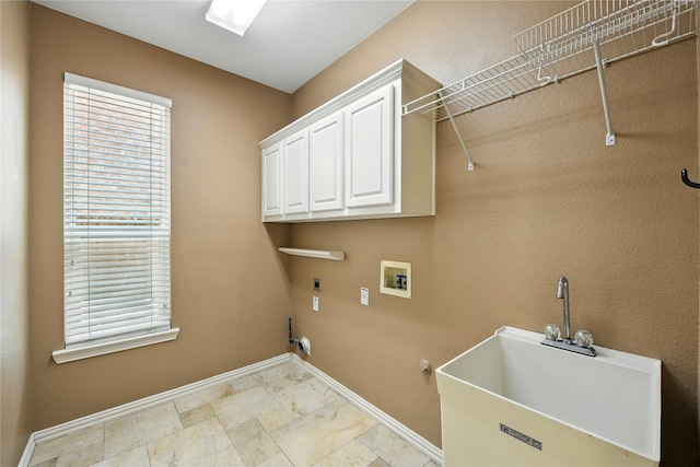 2908 Carterton Ct, Flower Mound, TX 75022 - laundry area featuring hookup for a gas dryer, washer hookup, hookup for an electric dryer, and cabinet space