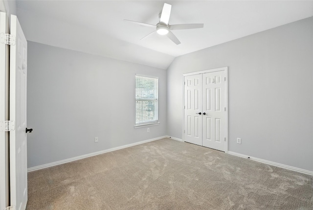2908 Carterton Ct, Flower Mound, TX 75022 - unfurnished bedroom with carpet, lofted ceiling, a closet, and a ceiling fan