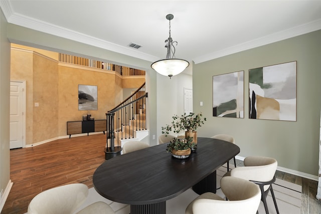 2908 Carterton Ct, Flower Mound, TX 75022 - dining area with stairs, wood finished floors, and crown molding