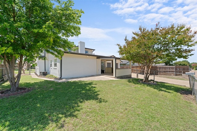 1315 Dunbarton Dr, Richardson, TX 75081 - view of front facade featuring a fenced backyard, a patio, and brick siding