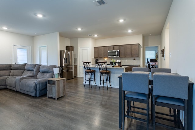 408 Cultivator Ct, Josephine, TX 75189 - living area featuring dark wood-type flooring and recessed lighting