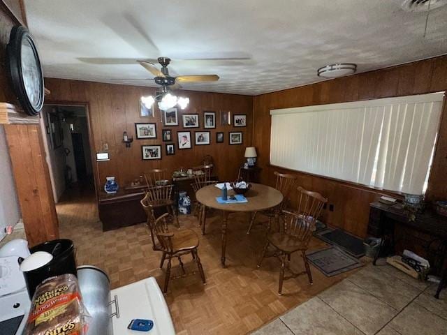 4411 Marigold Trl, Mesquite, TX 75150 - dining area featuring a ceiling fan and wooden walls
