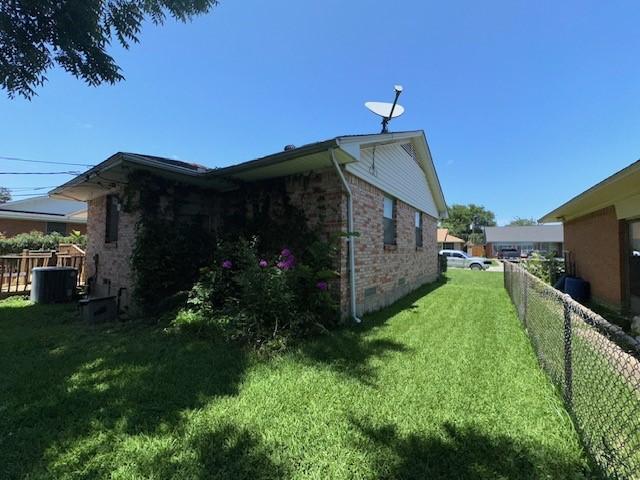 4411 Marigold Trl, Mesquite, TX 75150 - view of home's exterior featuring brick siding and crawl space