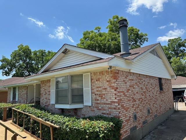 4411 Marigold Trl, Mesquite, TX 75150 - view of side of property with crawl space and brick siding