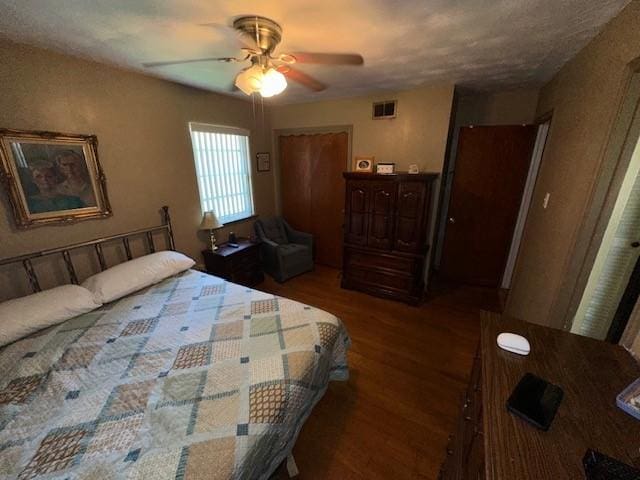 4411 Marigold Trl, Mesquite, TX 75150 - bedroom with wood finished floors and a ceiling fan