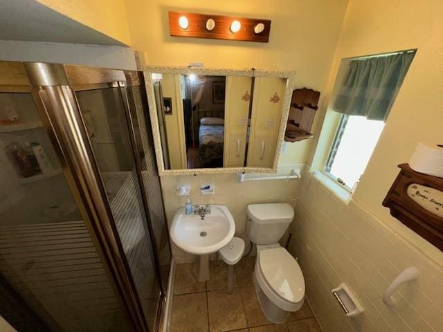 4411 Marigold Trl, Mesquite, TX 75150 - bathroom featuring a shower stall and tile patterned flooring