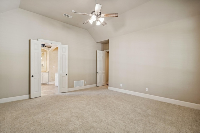 1316 Comal Dr, Allen, TX 75013 - unfurnished bedroom with lofted ceiling, light carpet, connected bathroom, and ceiling fan