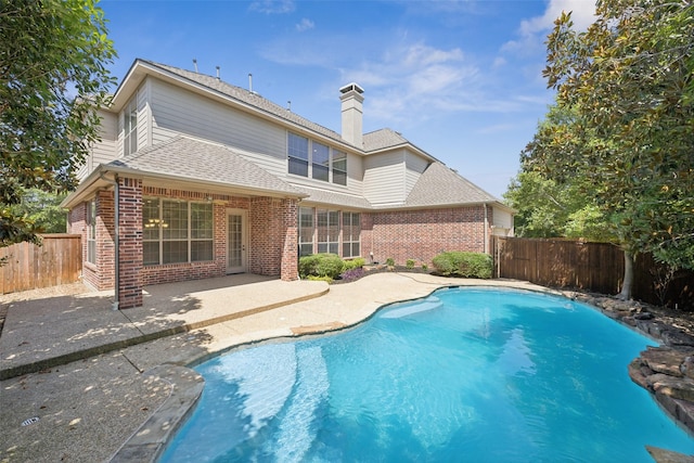1316 Comal Dr, Allen, TX 75013 - view of swimming pool with a patio area and a fenced backyard