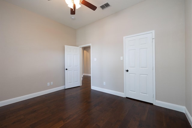 9705 Southern Hills Dr, Plano, TX 75025 - unfurnished bedroom featuring dark wood-style floors and ceiling fan