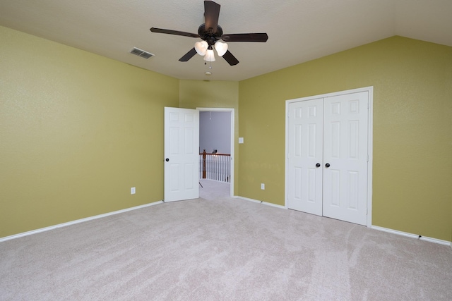 9705 Southern Hills Dr, Plano, TX 75025 - unfurnished bedroom featuring carpet, a closet, a ceiling fan, and vaulted ceiling