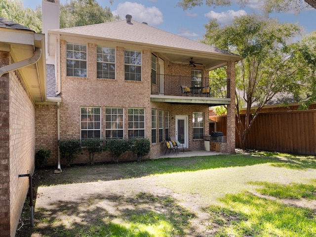 9705 Southern Hills Dr, Plano, TX 75025 - rear view of property featuring a balcony, a ceiling fan, brick siding, and a patio area