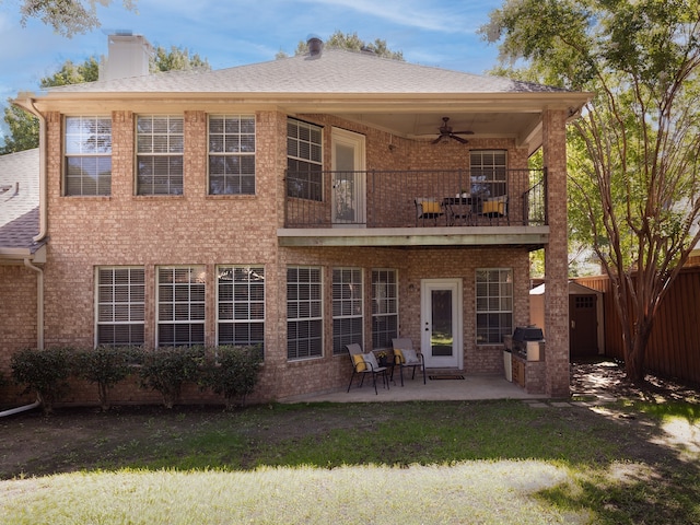 9705 Southern Hills Dr, Plano, TX 75025 - back of property with a balcony, a ceiling fan, brick siding, a patio, and a chimney