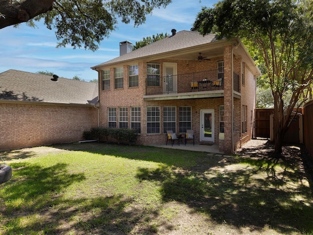 9705 Southern Hills Dr, Plano, TX 75025 - rear view of house with a balcony, brick siding, a ceiling fan, a chimney, and a patio area