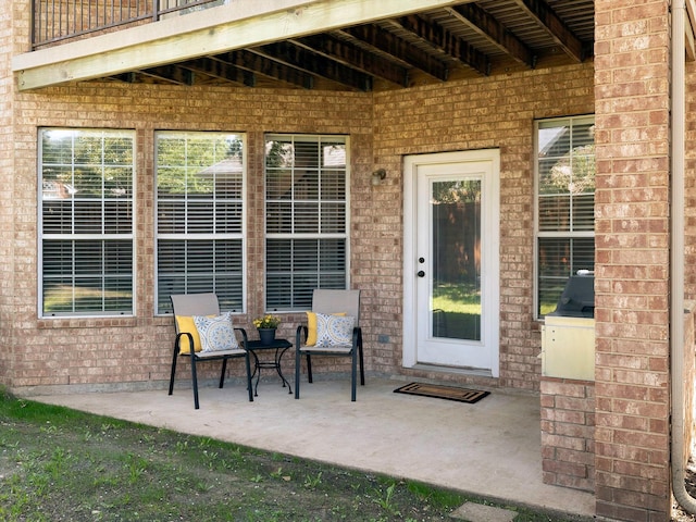 9705 Southern Hills Dr, Plano, TX 75025 - entrance to property with a patio and brick siding