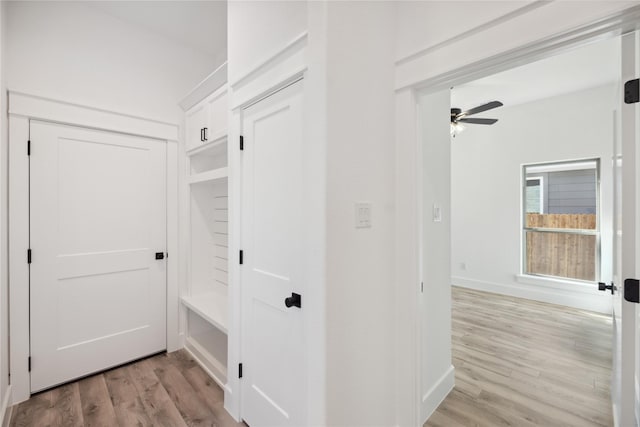 2700 NW 22nd St, Fort Worth, TX 76106 - hallway with light wood-style floors and baseboards