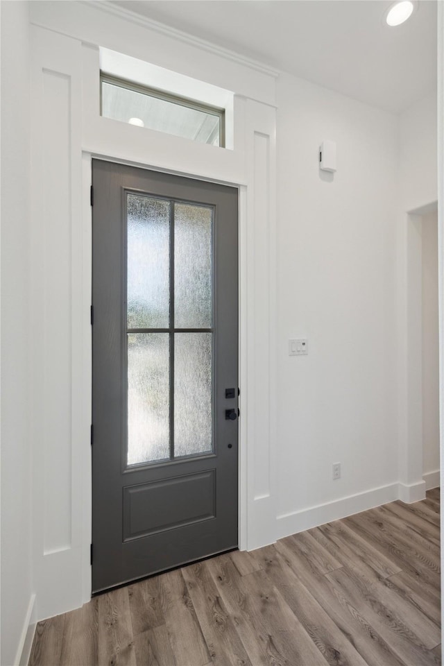 2700 NW 22nd St, Fort Worth, TX 76106 - doorway to outside with wood finished floors and baseboards